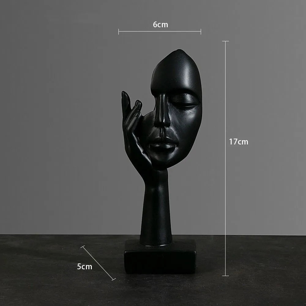 Resin female face statuette