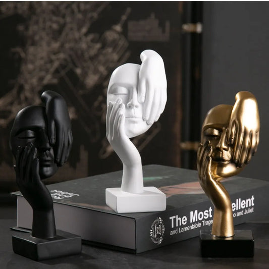 Resin female face statuette