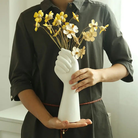 Resin vase in the shape of a hand